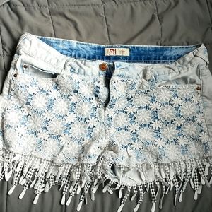 Low Rise tasseled shorts